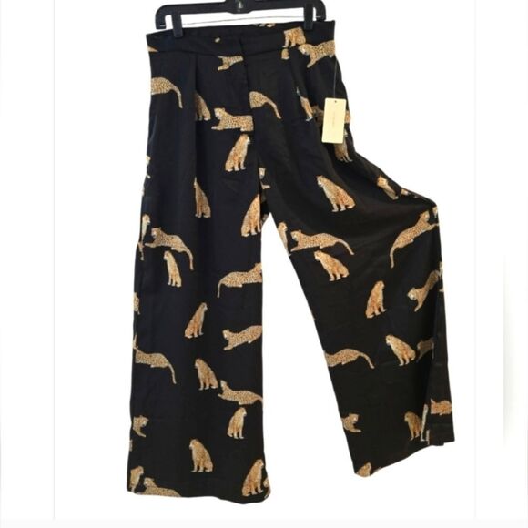 Stylish black wide-leg pants. Features a bold leopard print. - Picture 11 of 15